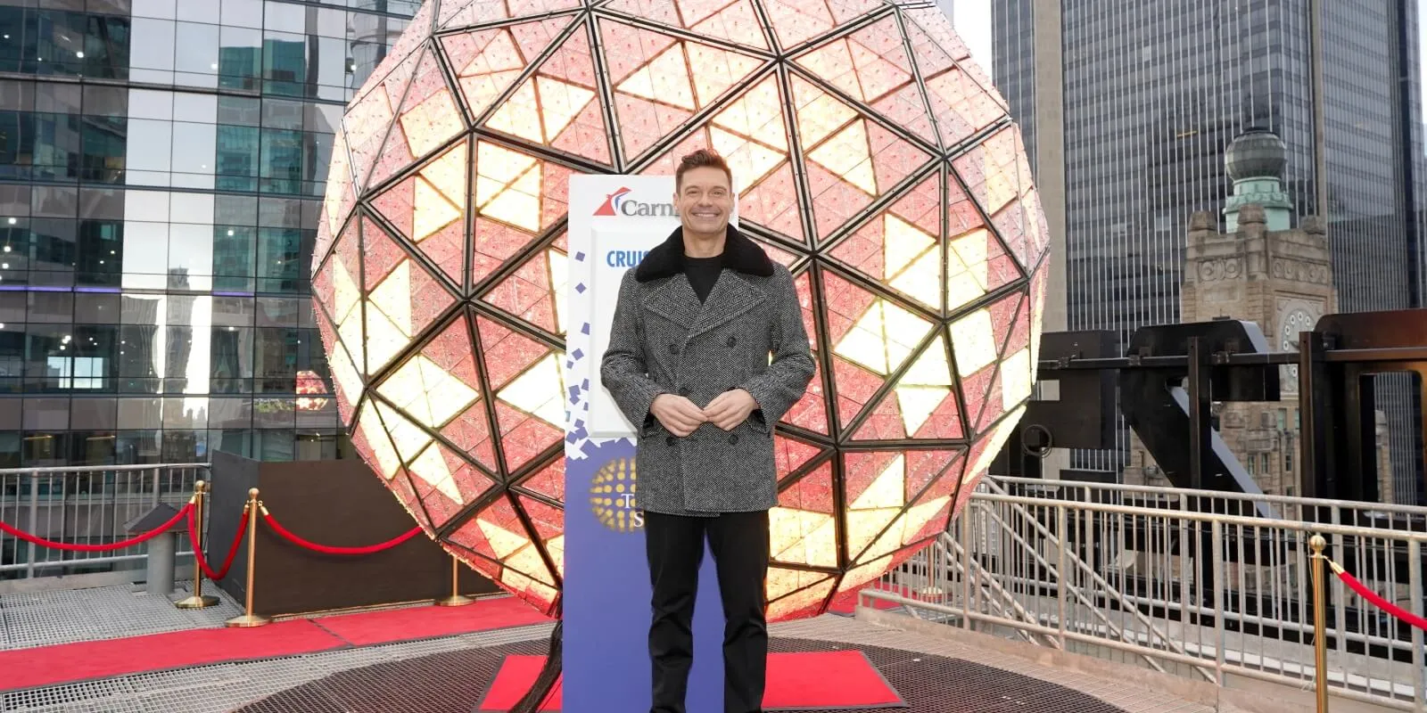 Ryan Seacrest in front of the New Year's Eve ball in Times Square, New York