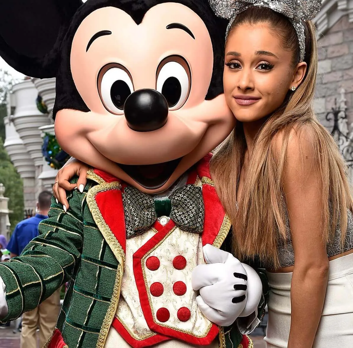 "Santa Tell Me" singer Ariana Grande with Mickey Mouse