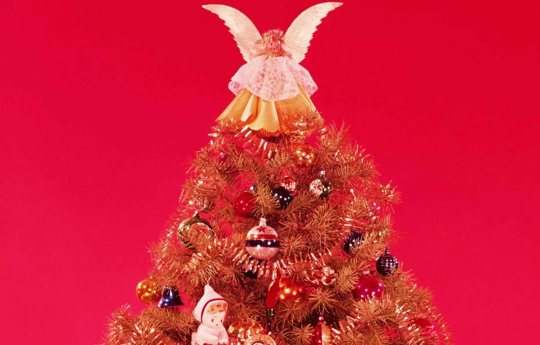 A Christmas tree with an angel on top