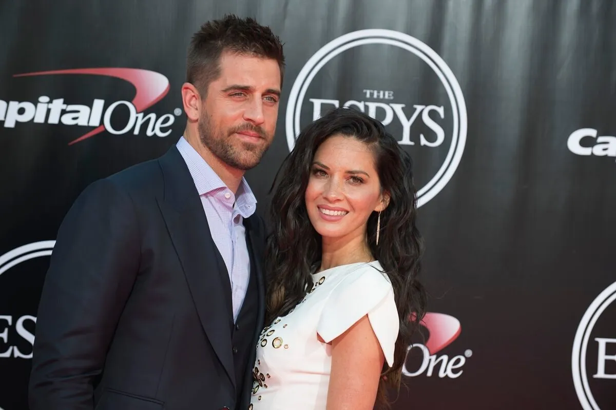 Aaron Rodgers and Olivia Munn pose on the red carpet at the ESPYS