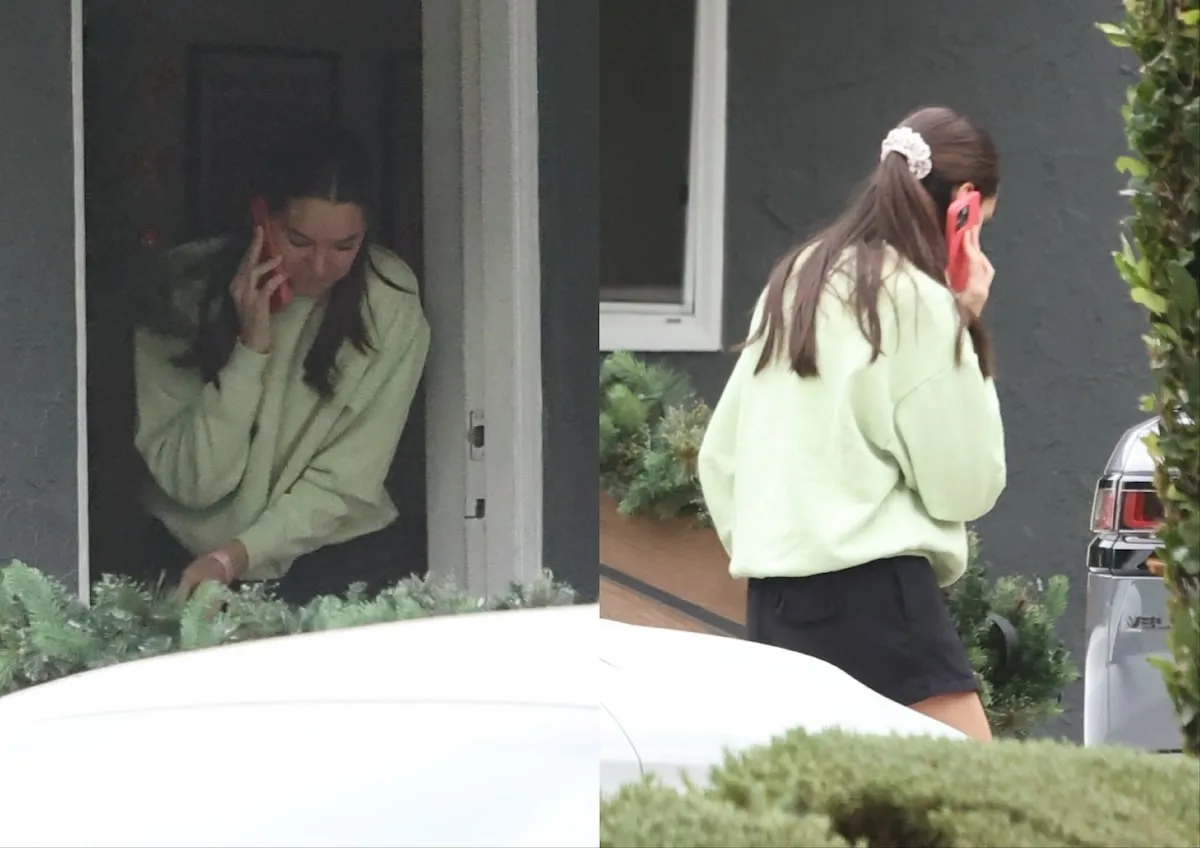 Wearing a green sweatshirt, Ally Lewber talks on the phone on December 12, 2024