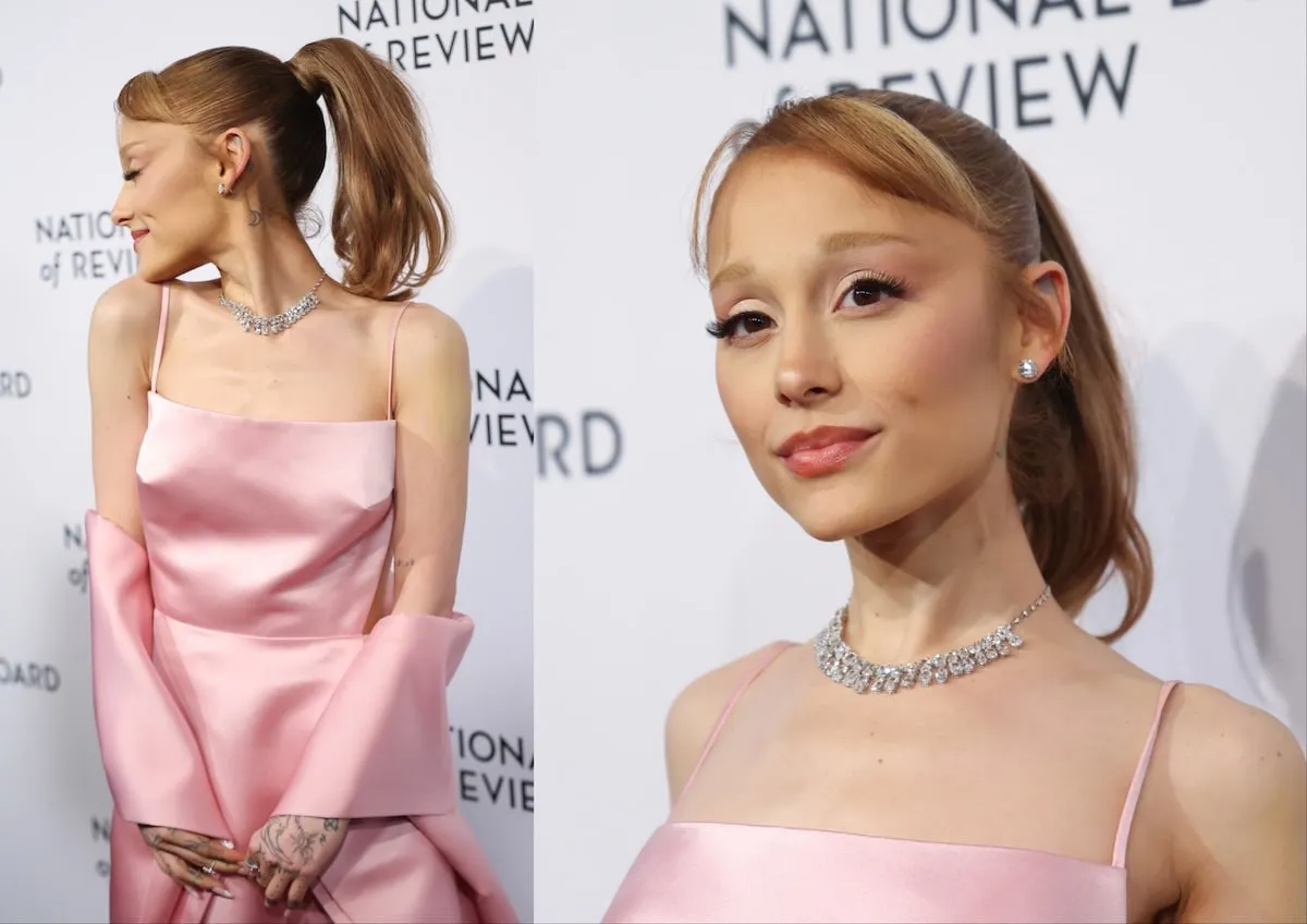 Wearing a pink satin dress, Ariana Grande poses for photos on the red carpet at the 2025 National Board of Review Gala