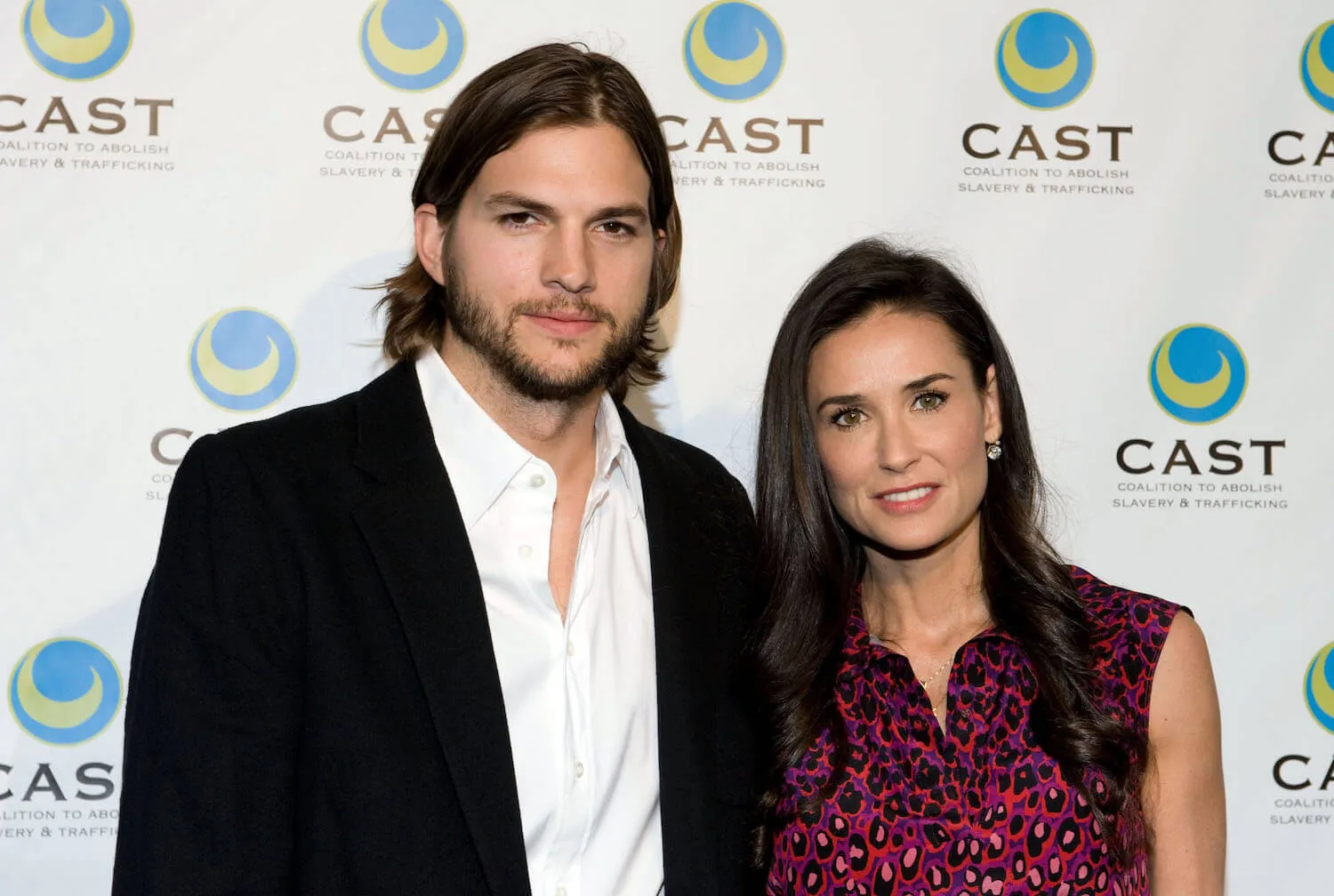 Ashton Kutcher and Demi Moore posing together in 2011