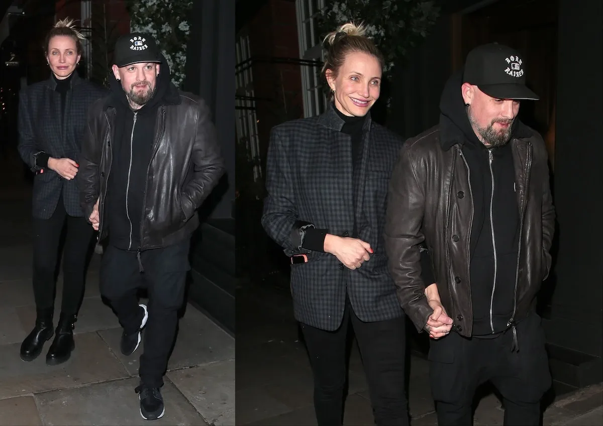 Dressed in all black, Cameron Diaz and Benji Madden dodge the paparazzi outside of a London restaurant