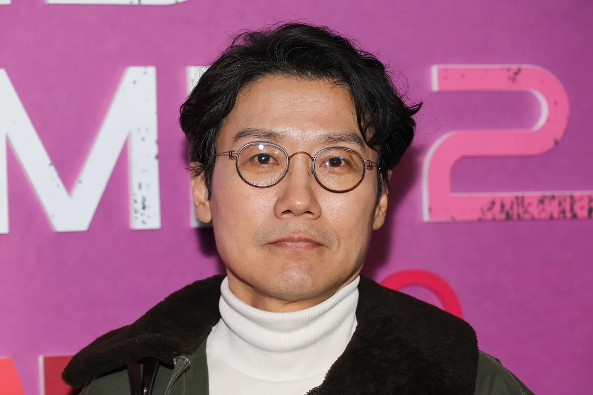 Squid Game Creator Hwang Dong-Hyuk posing at the 'Squid Game' premiere.