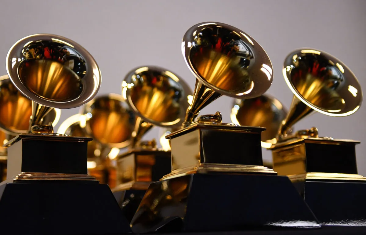 A group of Grammy statues at the awards show.