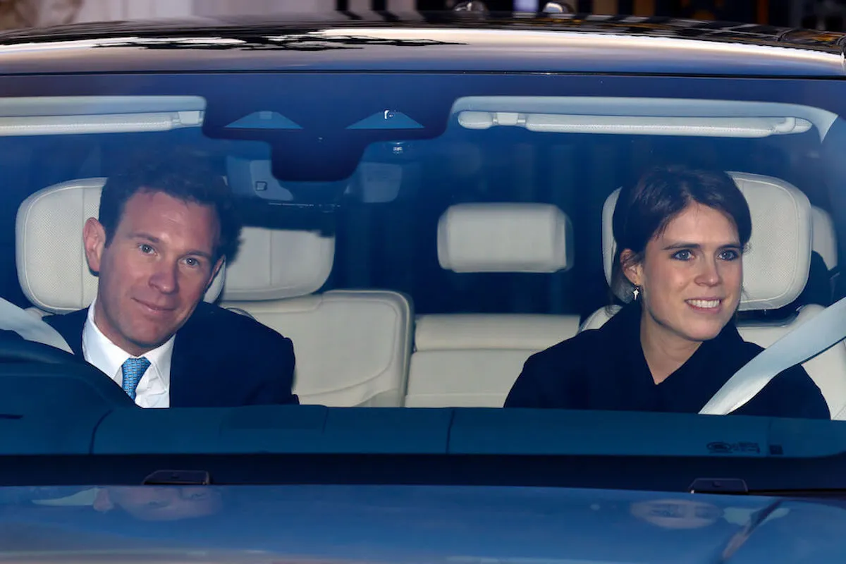 Jack Brooksbank and Princess Eugenie, who have a home in Portugal, in a car.