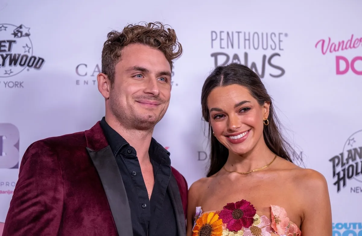 Reality TV stars James Kennedy and Ally Lewber stand together on the red carpet on November 15