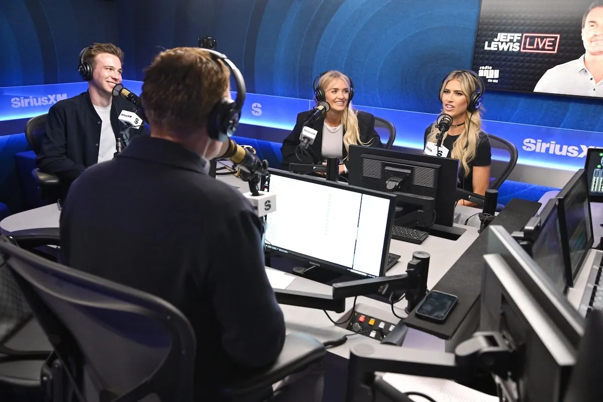 Design partners Kylie Wing and Christina Haack sit in front of their microphones on the 'Jeff Lewis Live' radio show