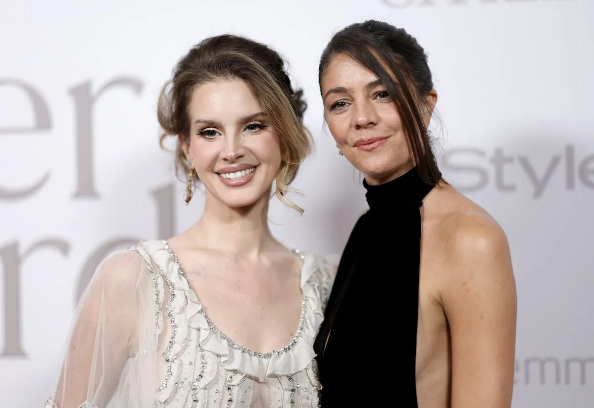 Stylist Molly Dickson smiles with Lana Del Rey on the InStyle red carpet in 2024