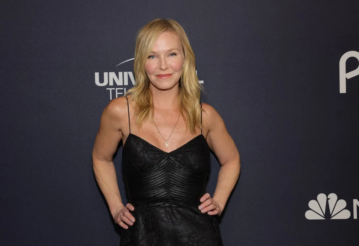 Kelli Giddish attends the "Law & Order: Special Victims Unit" 25th Anniversary Celebration in a black dress.