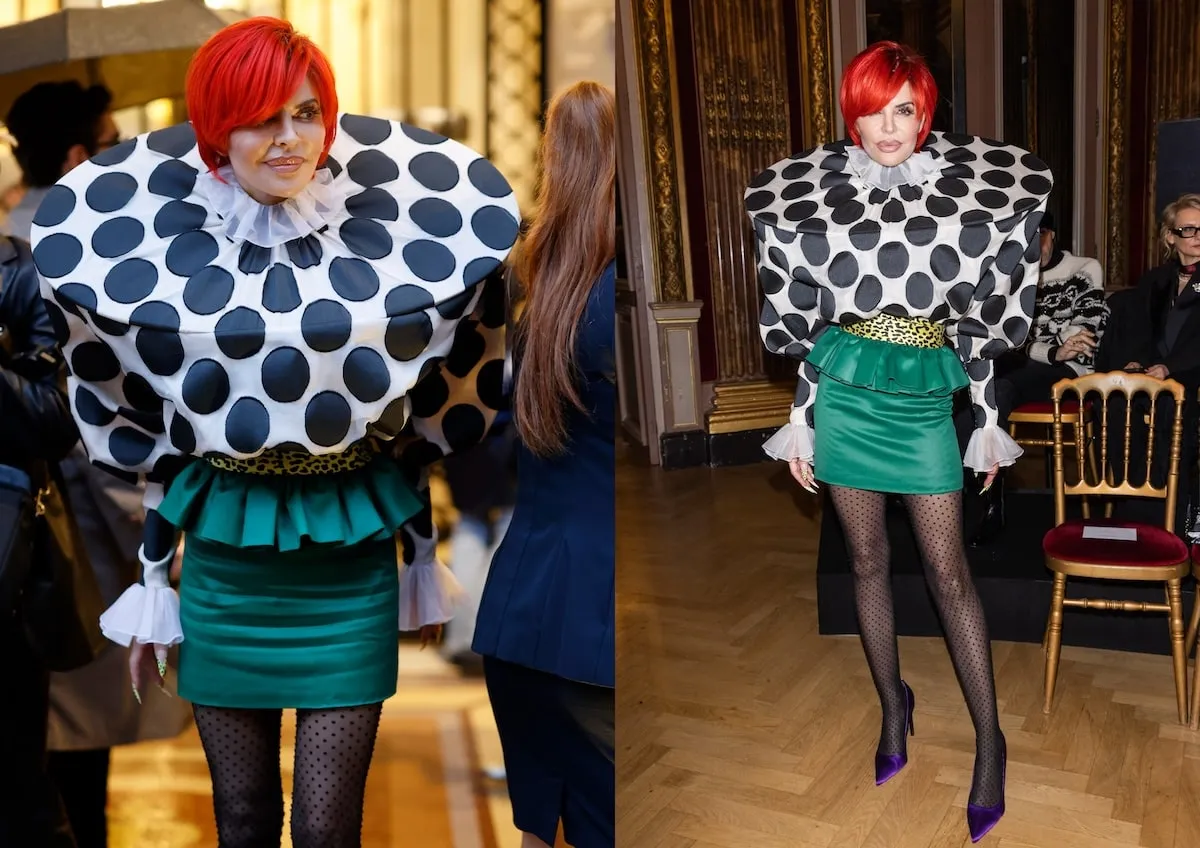 Wearing polka dots and an orange wig, Lisa Rinna peeks outside of the Viktor & Rolf fashion show in Paris