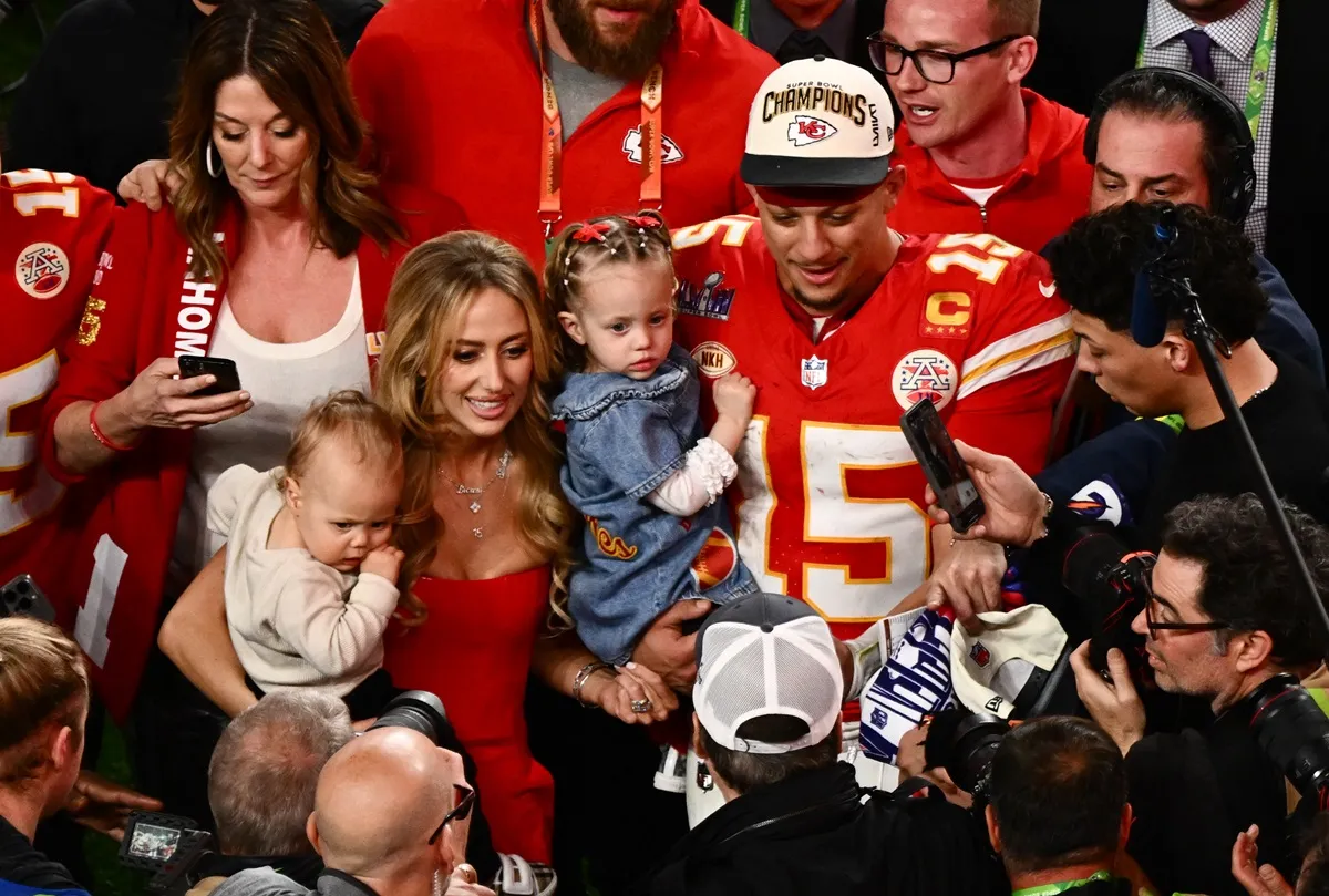 Kansas City Chiefs' quarterback #15 Patrick Mahomes with his wife Brittany Mahomes and their children Bronze and Sterling celebrate winning Super Bowl LVIII against the San Francisco 49ers at Allegiant Stadium in Las Vegas, Nevada, February 11, 2024. 