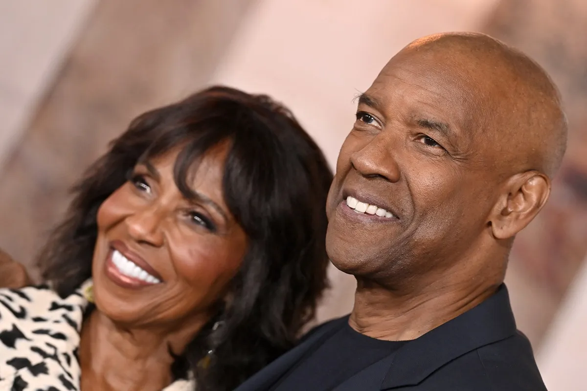 Denzel Washington smiling alongside Pauletta Washington at the Los Angeles Premiere of Paramount Pictures "Gladiator II".