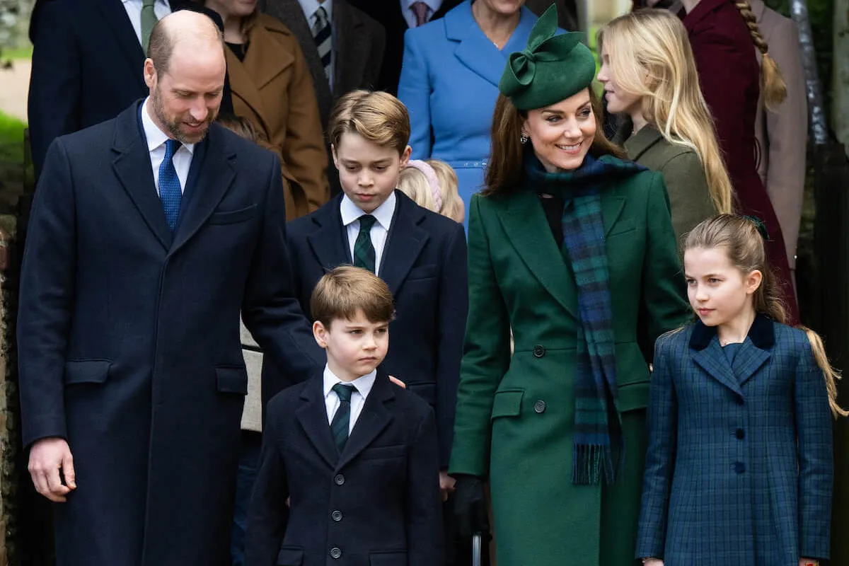 Prince William, Prince George, Prince Louis, Kate Middleton, and Princess Charlotte walk together. 