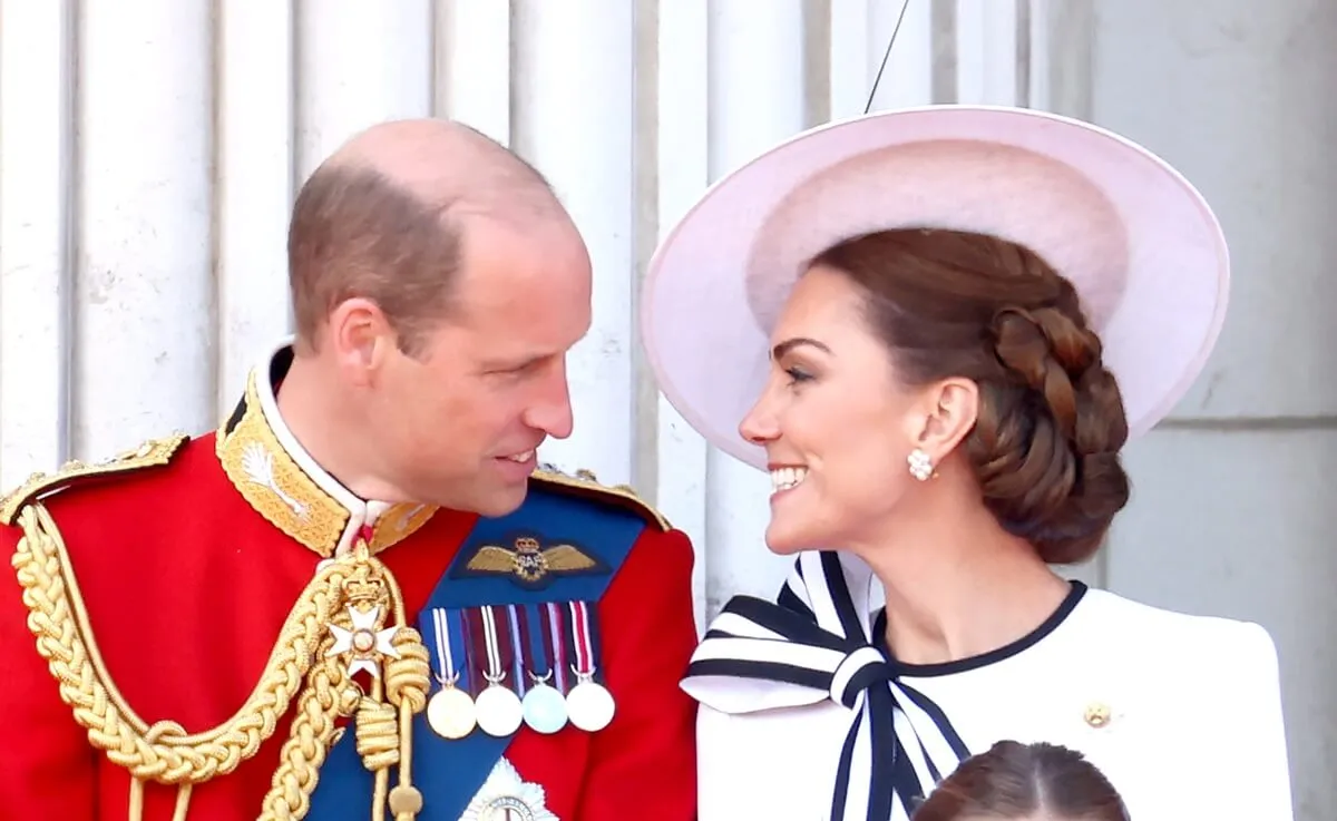 Prince William and Kate Middleton standing on the balcony of Buckingham Palace during 2024 Trooping the Color