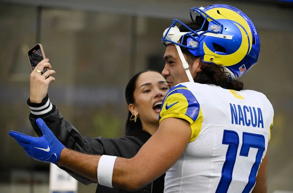 Puka Nacua takes a selfie with his girlfriend, Hallie Aiono, prior to game between the Los Angeles Rams and the Cleveland Browns at SoFi Stadium in Inglewood