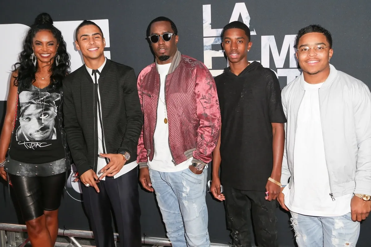 Sean Diddy Combs stands with Kim Porter, Quincy Brown, Christian Combs, and Justin Combs on the red carpet at the LA Film Festival in 2015