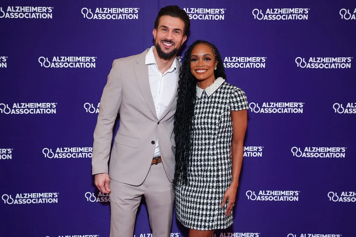 Former Bachelorette couple Bryan Abasolo and Rachel Lindsay smile together at the 2023 Alzheimer's Association Peace of Mind Luncheon