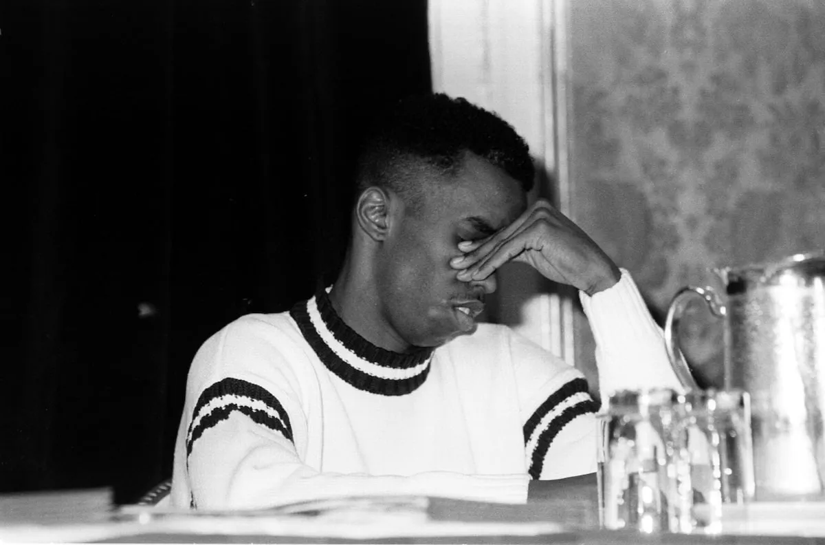 Rapper Sean "Diddy" Combs frowns during a press conference on January 2, 1992, following a deadly stampede during a concert at the City College of New York