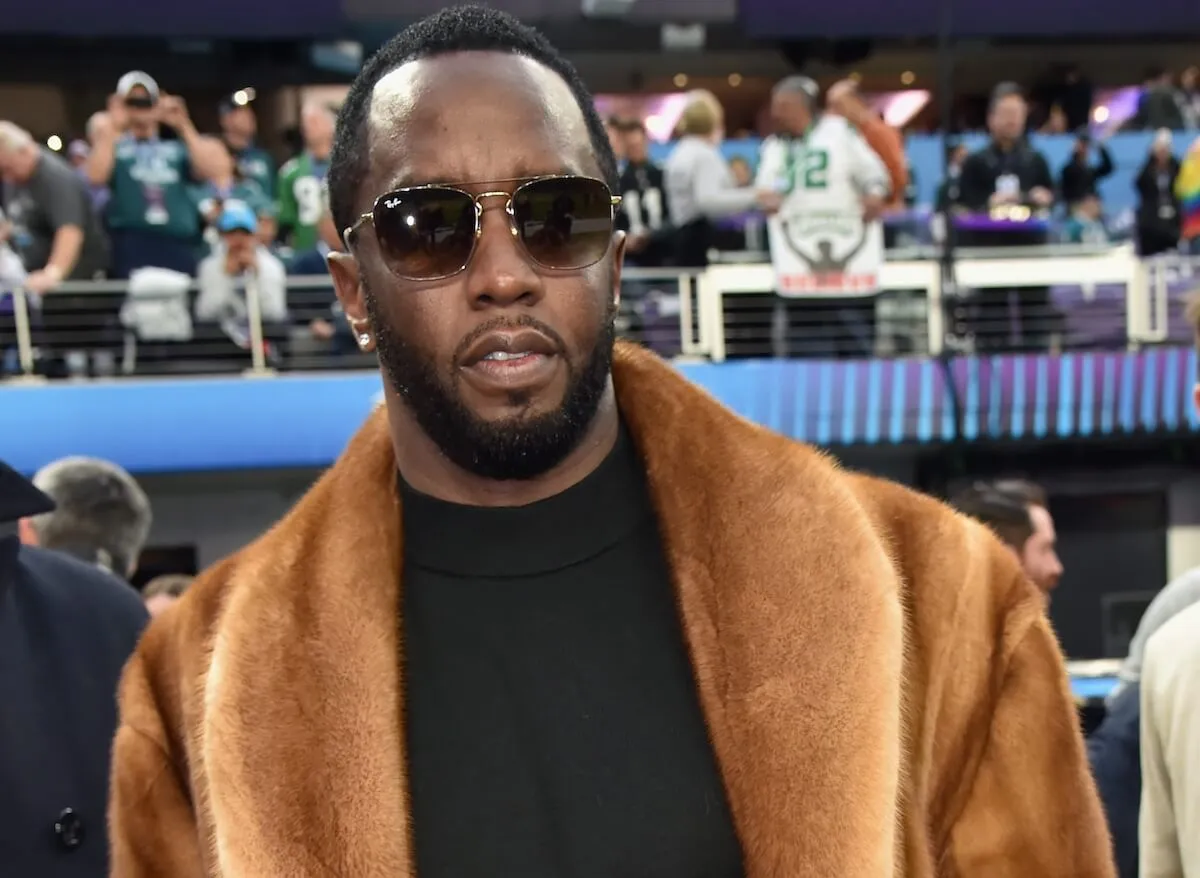 Sean 'Diddy' Combs in a brown fur coat and sunglasses at the Super Bowl in 2018