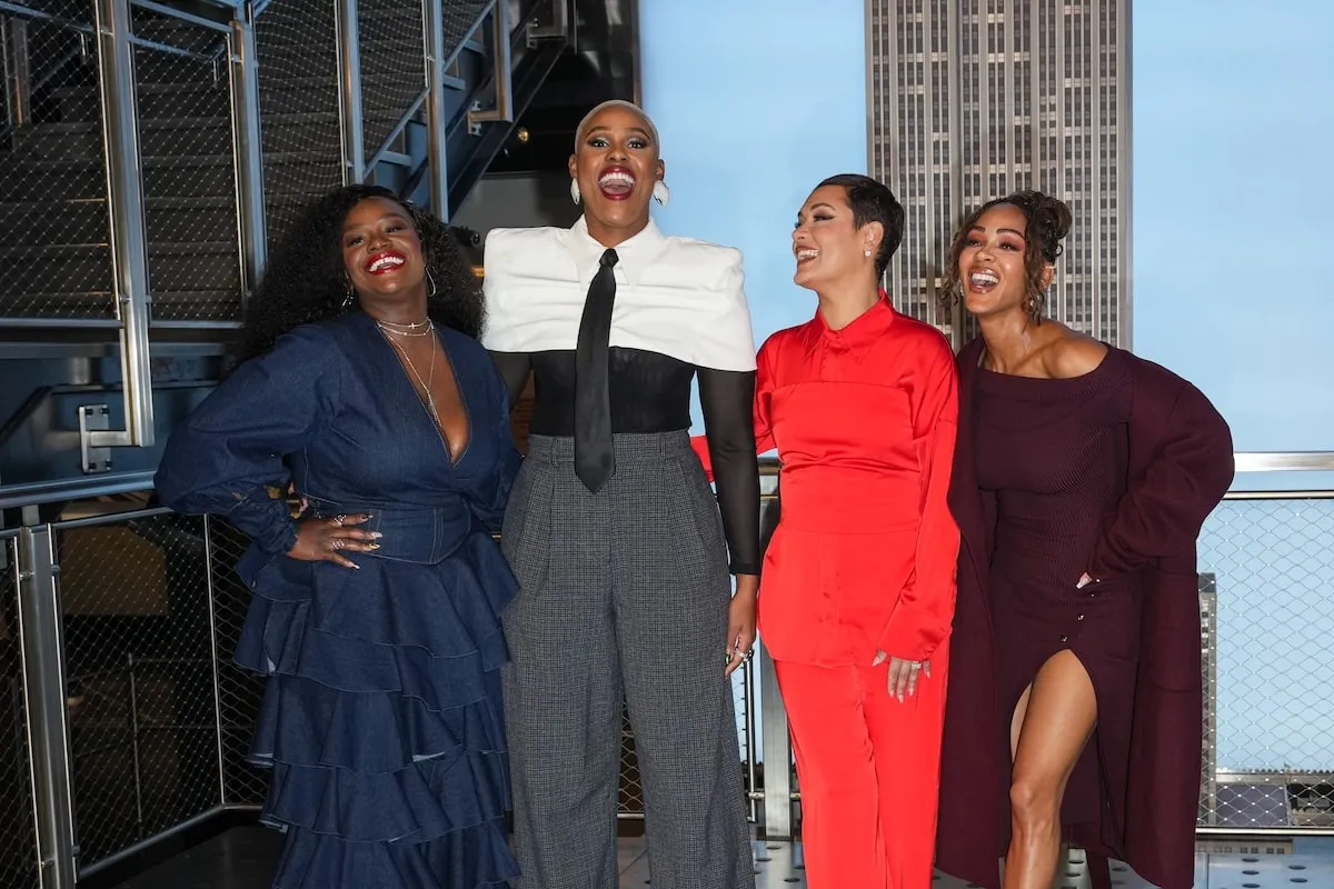 Harlem stars Shoniqua Shandai, Jerrie Johnson, Grace Byers, and Meagan Good pose for a photo inside the Empire State Building