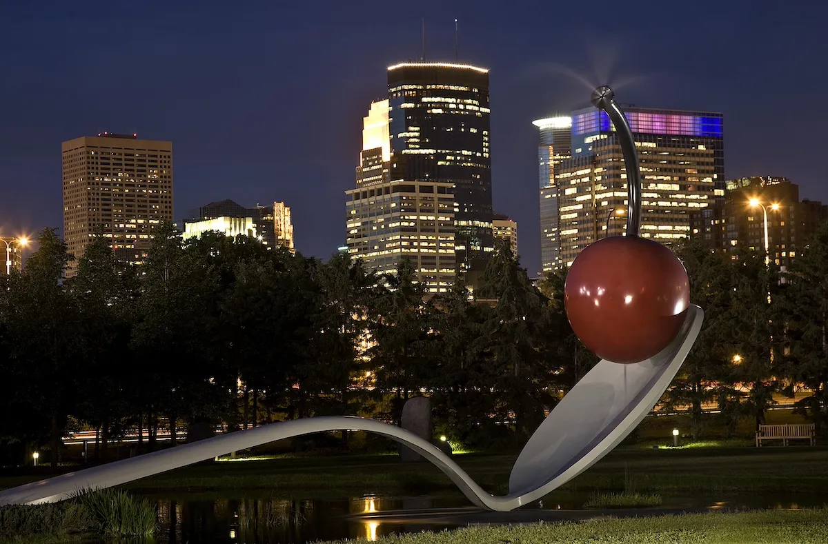 View of Spoonbridge and Cherry sculpture with Minneapolis skyline in the background