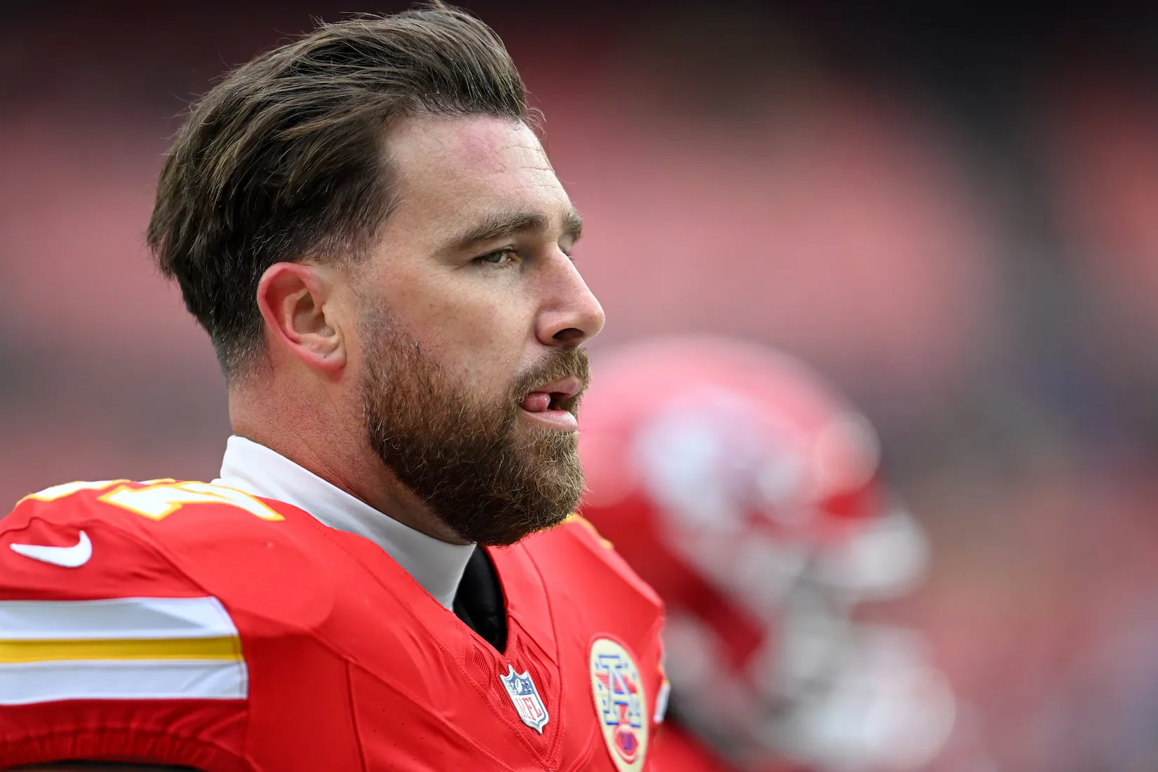 A close-up of the side of Travis Kelce's face as he plays for the Kansas City Chiefs