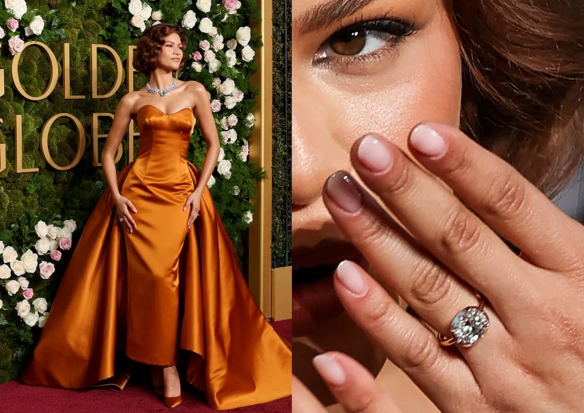 Wearing an orange dress, Zendaya poses on the red carpet in an orange Louis Vuitton dress while wearing her engagement ring from Tom Holland