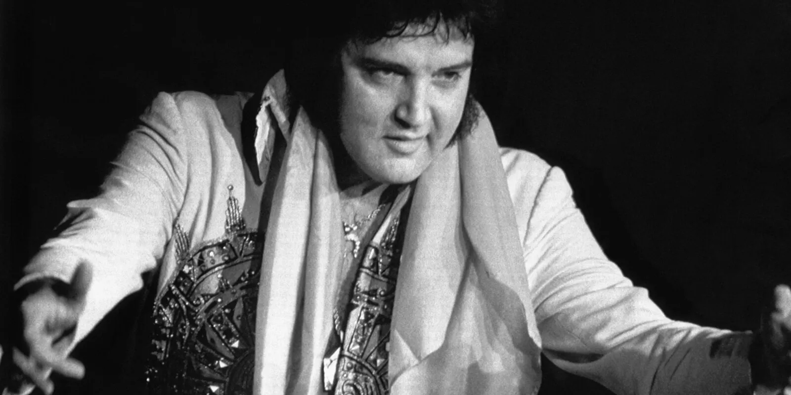 Elvis Presley performs in August 1977.