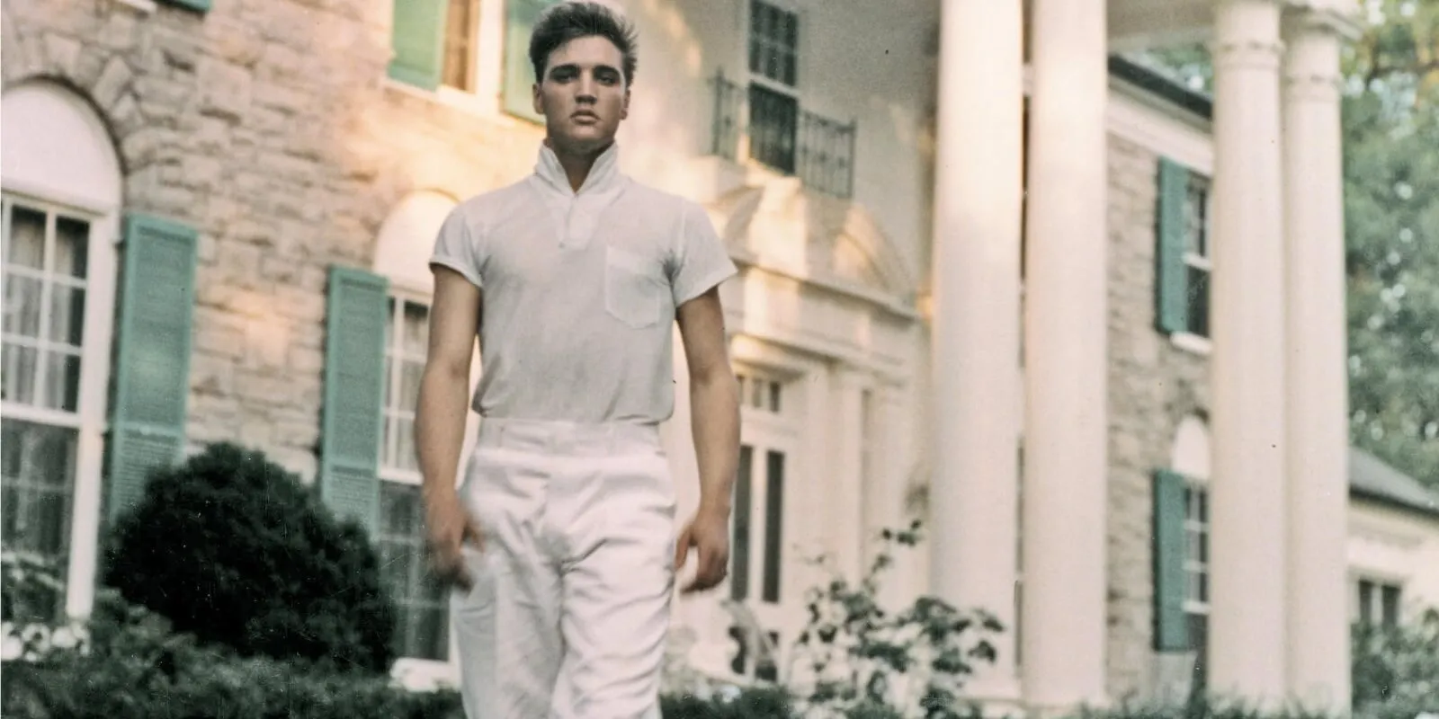 Elvis Presley pictured outside of his Graceland home