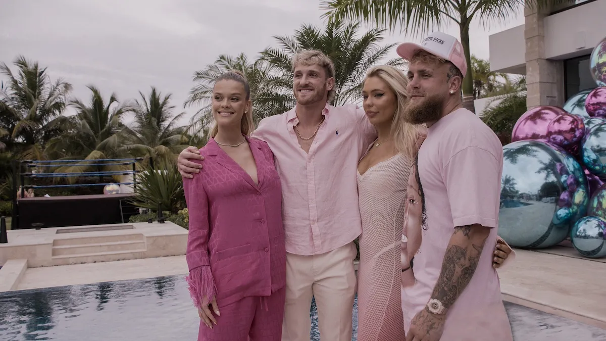 Jake and Logan Paul with their blonde girlfriends, everyone dressed in pink