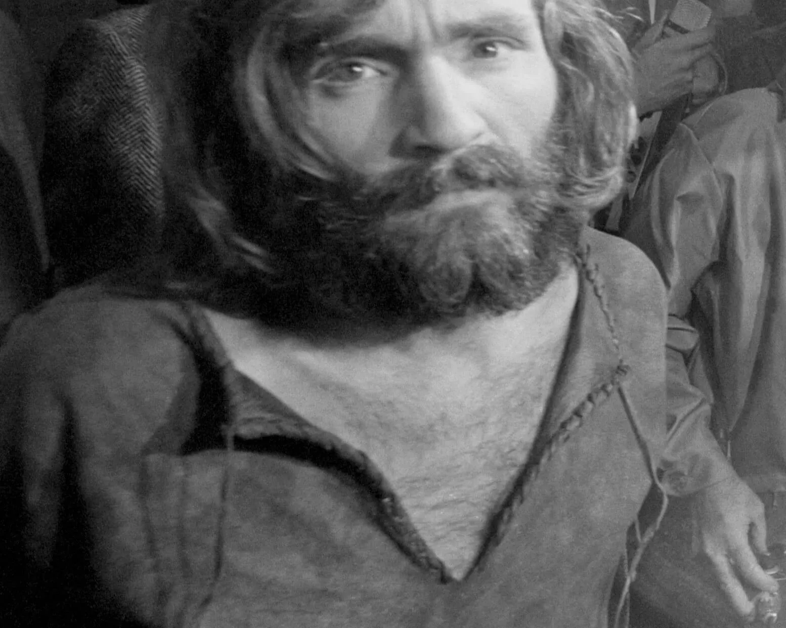 Charles Manson, a criminal inspired by The Beatles' "Helter Skelter," in black-and-white