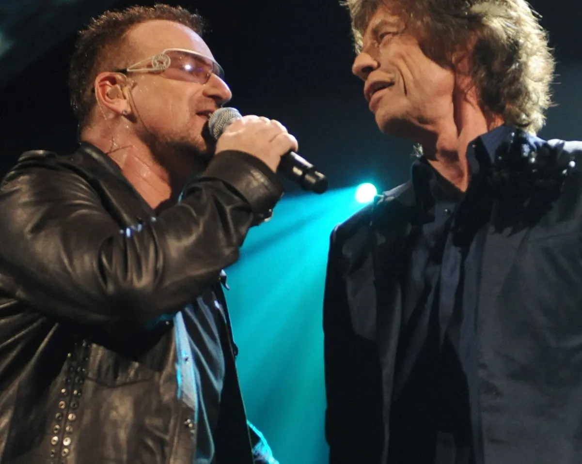 U2's Bono standing next to The Rolling Stones' Mick Jagger