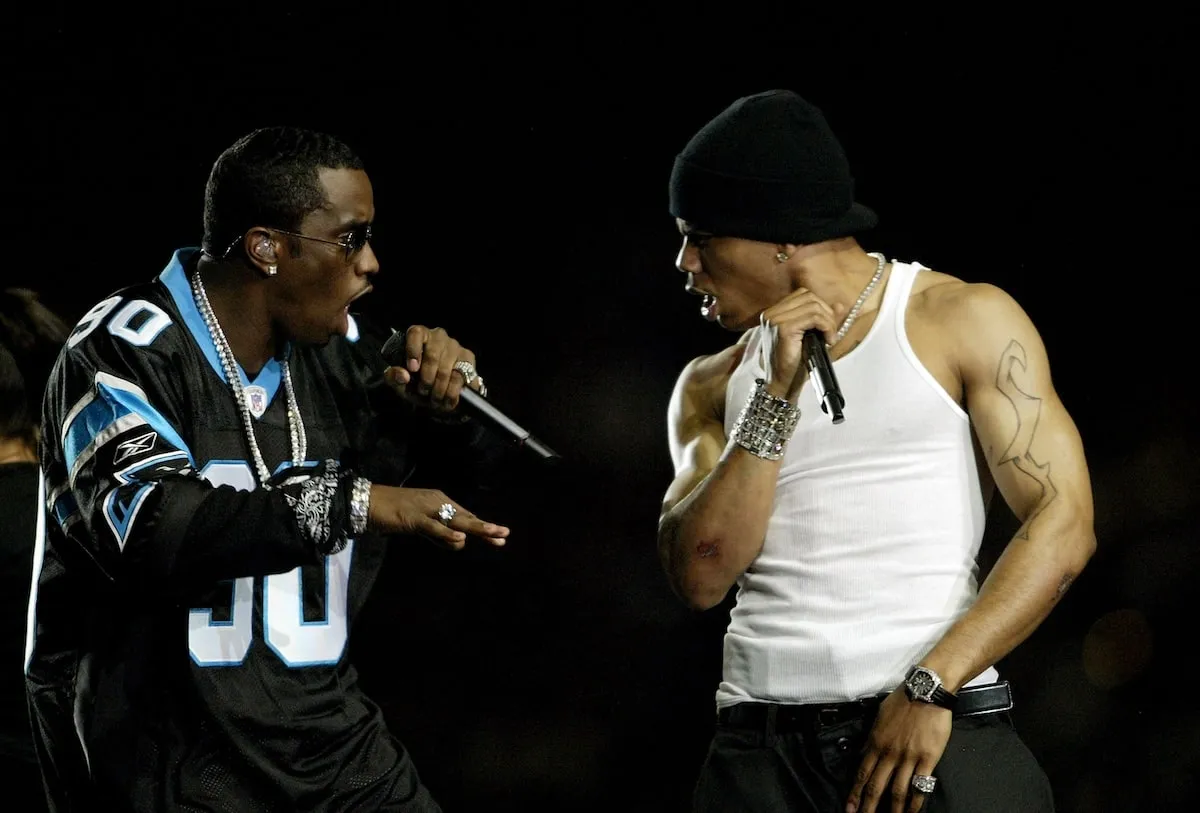 Rappers Sean 'P. Diddy' Combs and Nelly perform during the halftime show at Super Bowl XXXVIII