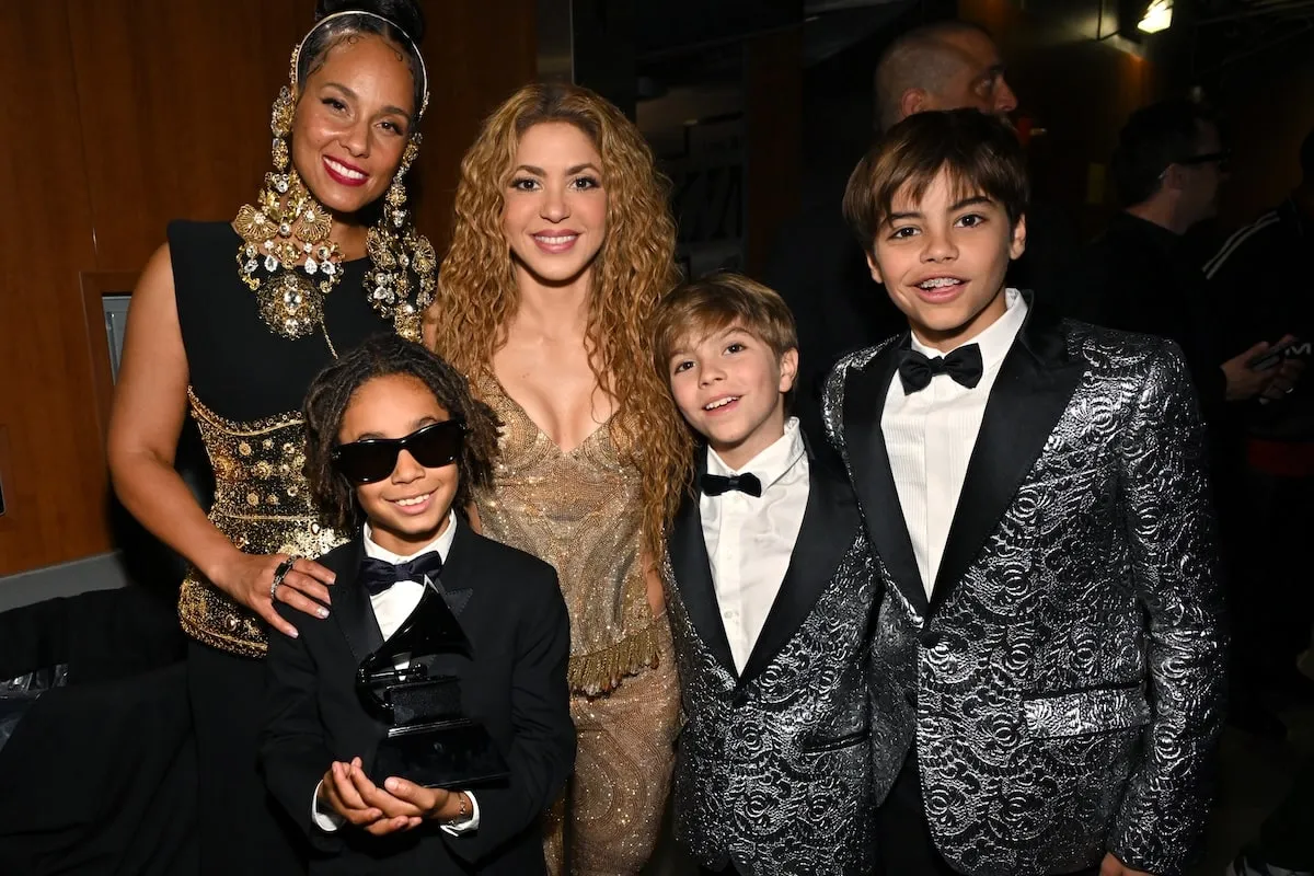 Shakira and Alicia Keys smiles with their sons backstage at the 2025 Grammy Awards