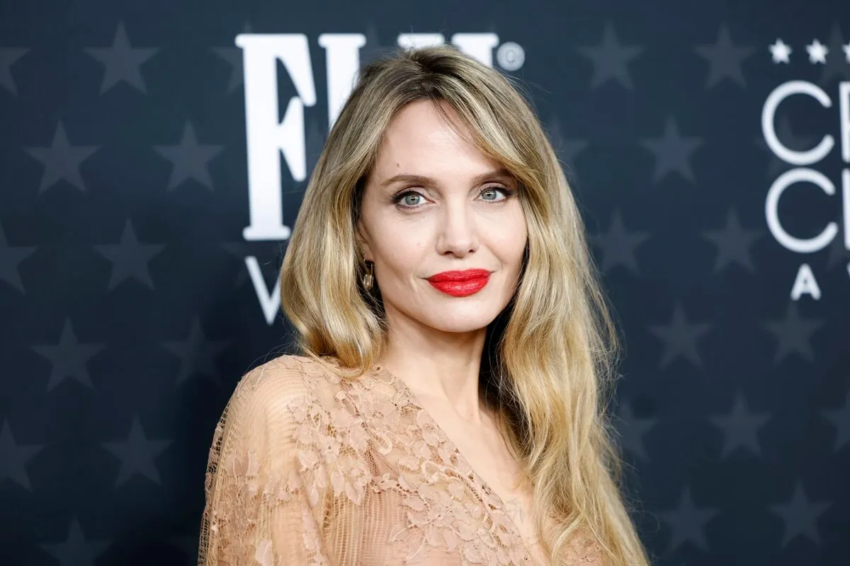 Angelina Jolie posing at the 30th Annual Critics Choice Awards.