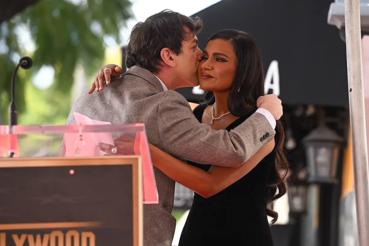 Actor B.J. Novak kisses Mindy Kaling on the cheek after giving a speech about her on the Hollywood Walk of Fame