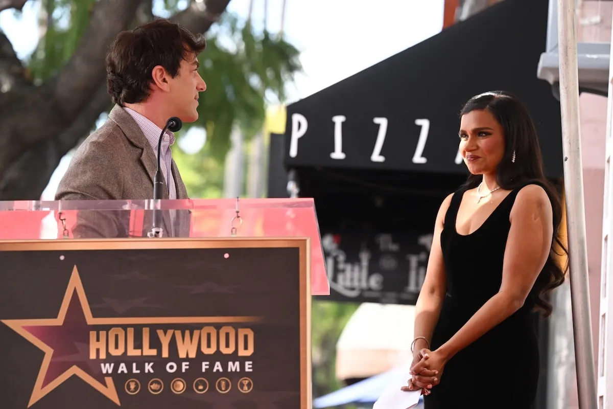 Actor B.J. Novak looks at Mindy Kaling while giving a speech about her on the Hollywood Walk of Fame