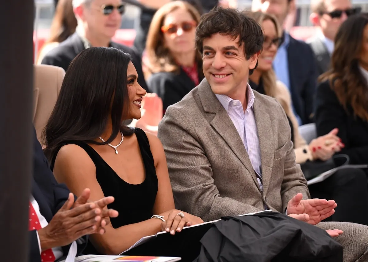 Actor B.J. Novak looks at Mindy Kaling at her Hollywood Walk of Fame ceremony