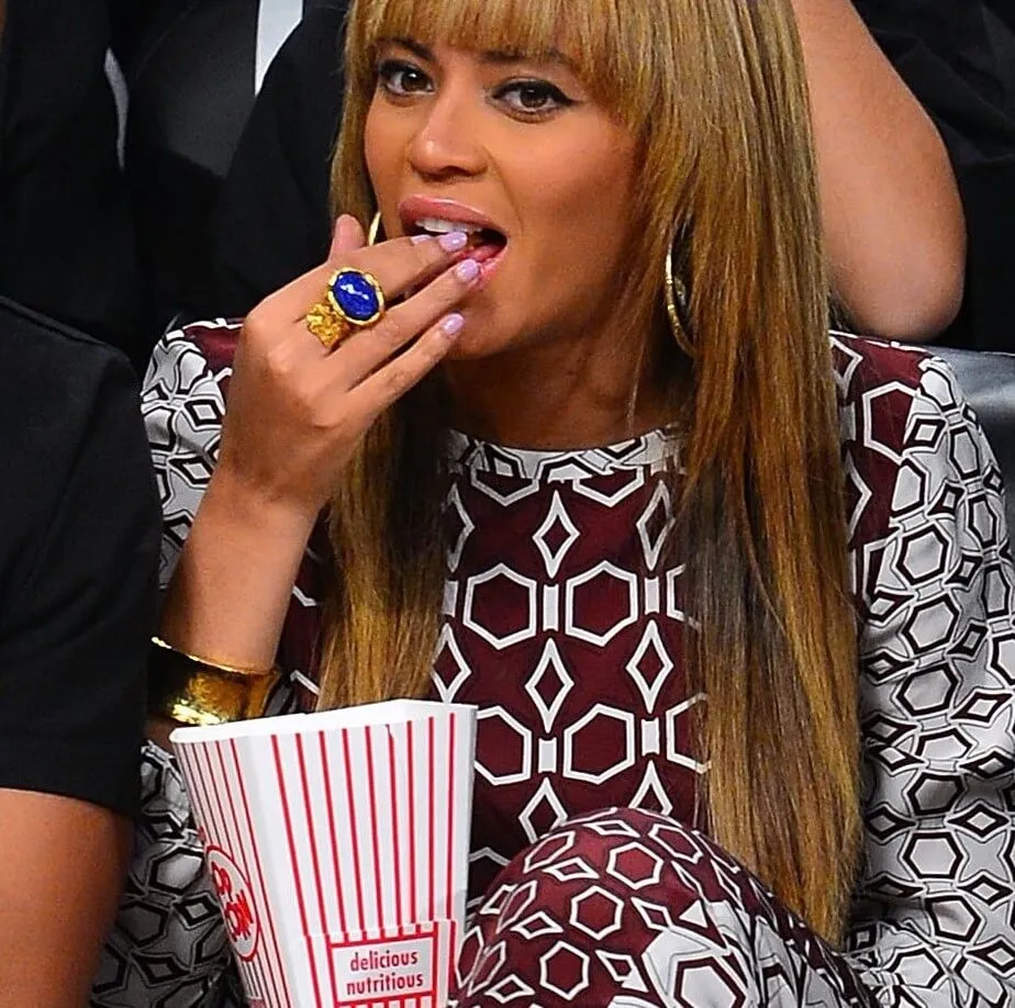 "If I Were a Boy" singer Beyoncé eating popcorn