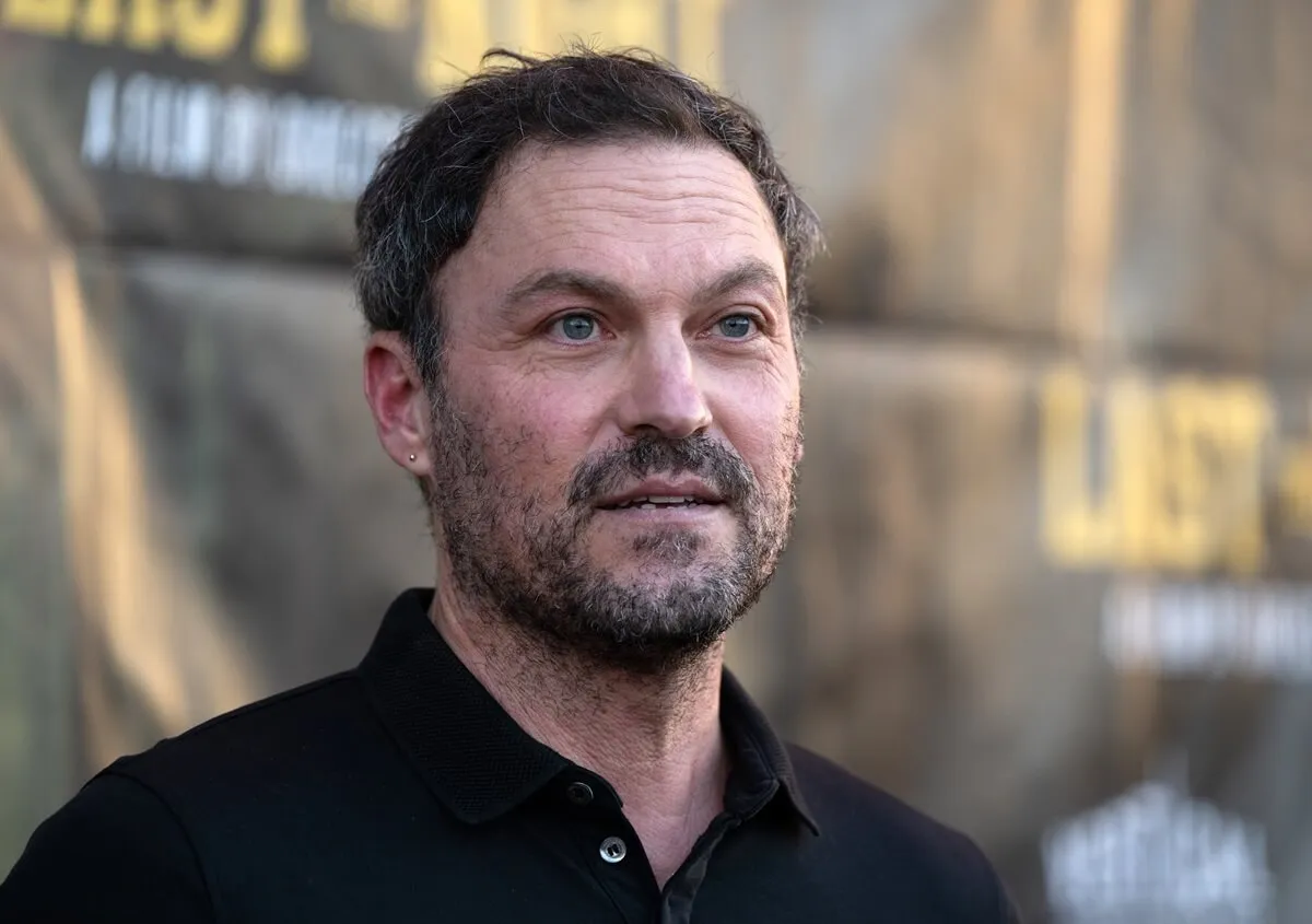 Brian Austin Green posing at the premiere of "Last The Night" in a black shirt.