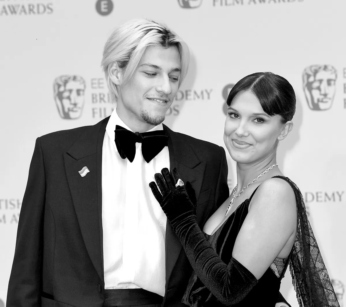 Jake Bongiovi and Millie Bobby Brown attend the EE British Academy Film Awards 2022 at Royal Albert Hall on March 13, 2022 in London, England