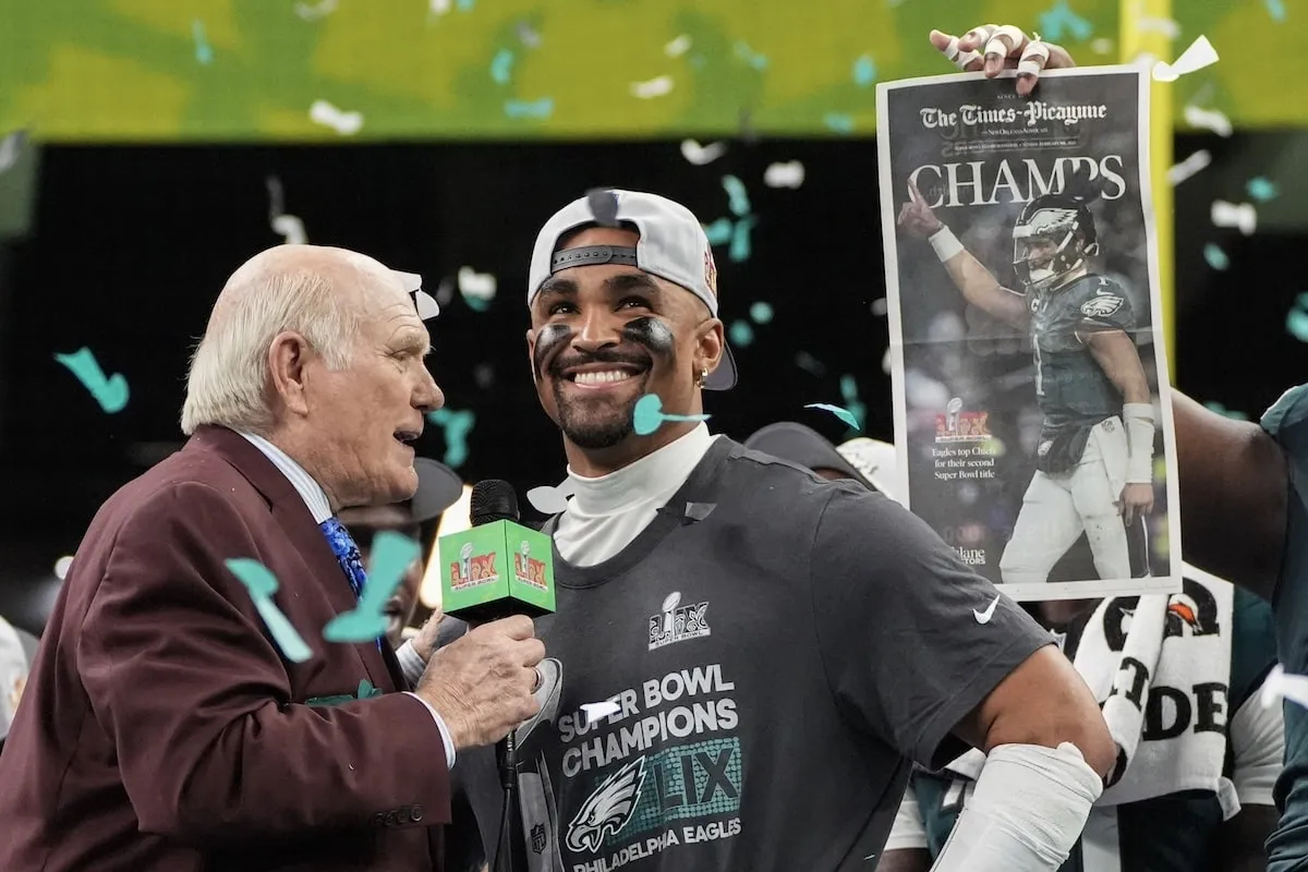 Former NFL quarterback Terry Bradshaw interviews Philadelphia Eagles quarterback Jalen Hurts after winning Super Bowl LIX