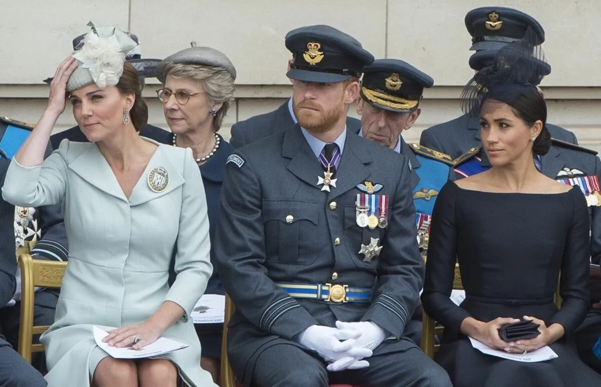 Kate Middleton, Prince Harry, and Meghan Markle during the RAF 100 ceremony at Buckingham Palace