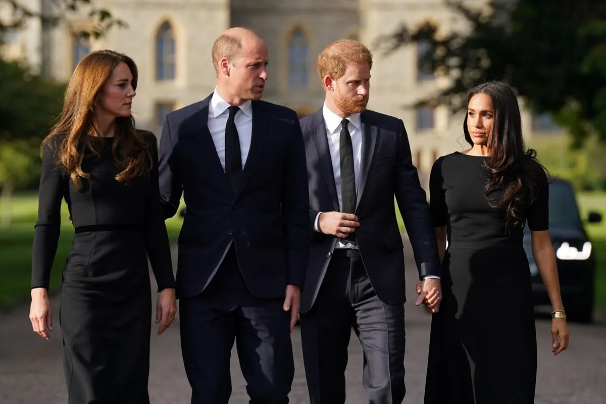 Kate Middleton, Prince William, Prince Harry, and Meghan Markle arrive at Windsor Castle to meet well-wishers following the death of Queen Elizabeth II