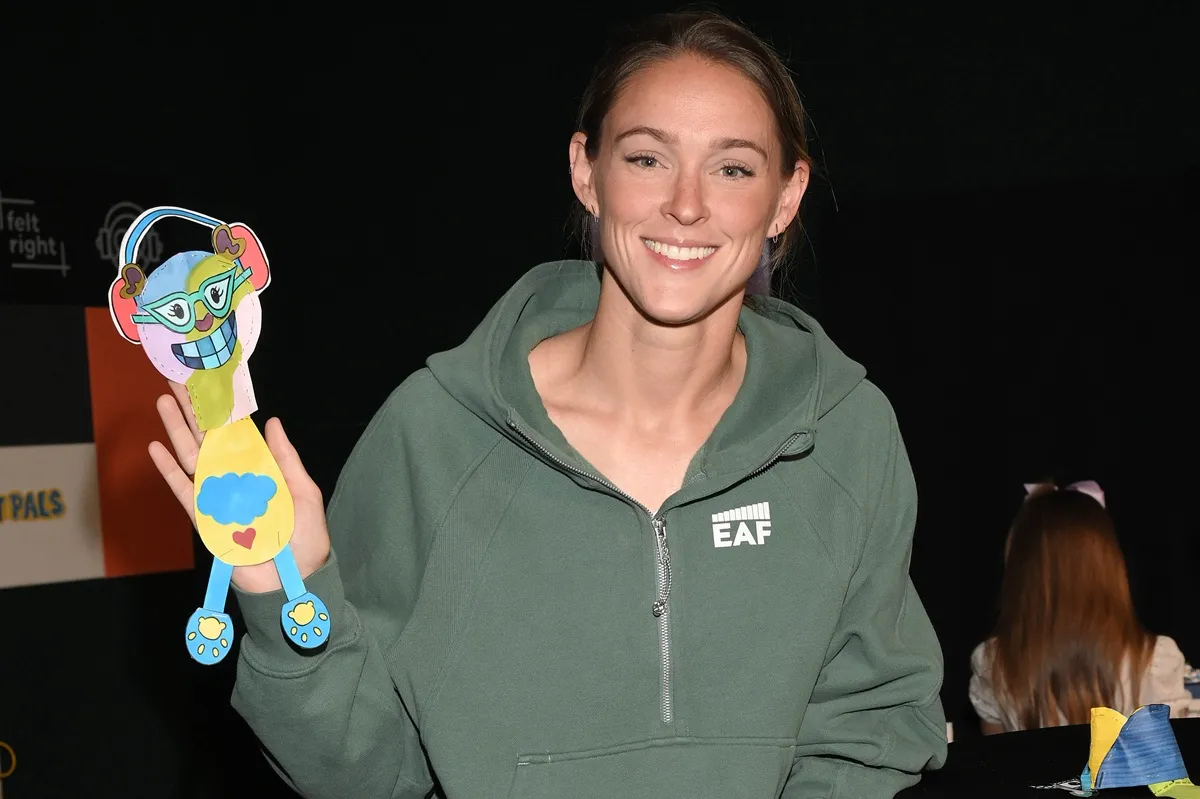 Kylie Kelce poses with the new Print Pals printable puppets from technology company HP, to help neurodivergent children express themselves through the therapeutic power of creative expression at the Eagles Autism Foundation (EAF) sensory room in Philadelphia, PA.