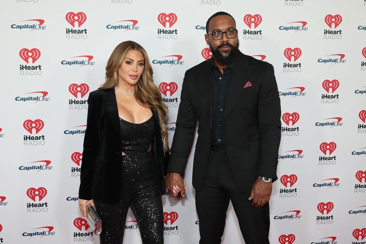 Marcus Jordan and Larsa Pippen holds hands at the iHeartRadio Jingle Ball 2023