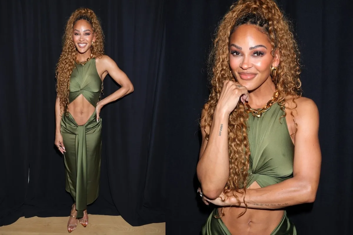 Wearing a green dress with a stomach cutout, Meagan Good shows off her toned tummy