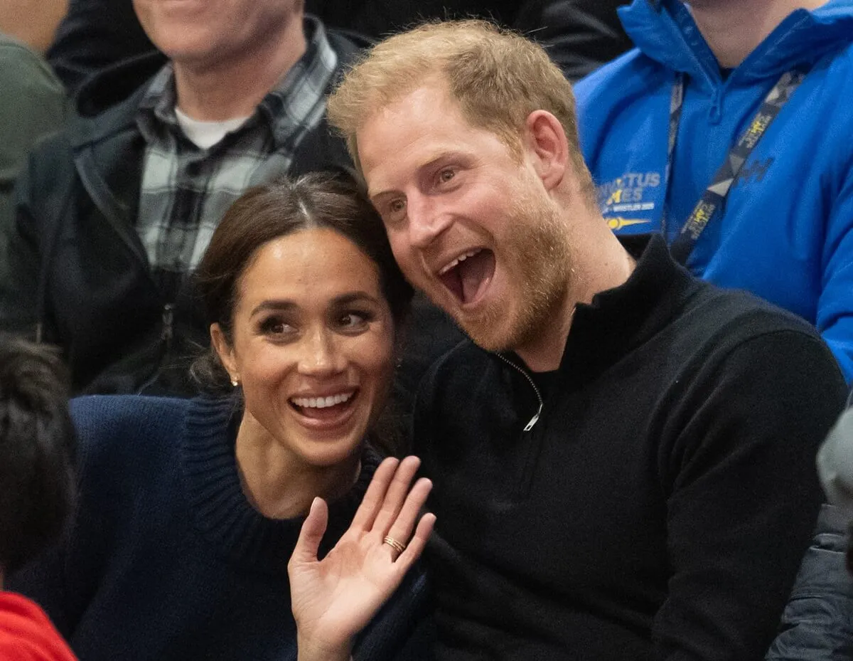 Meghan Markle and Prince Harry pose for a photo as they attend the Wheelchair Basketball final between USA and Israel during the 2025 Invictus Games